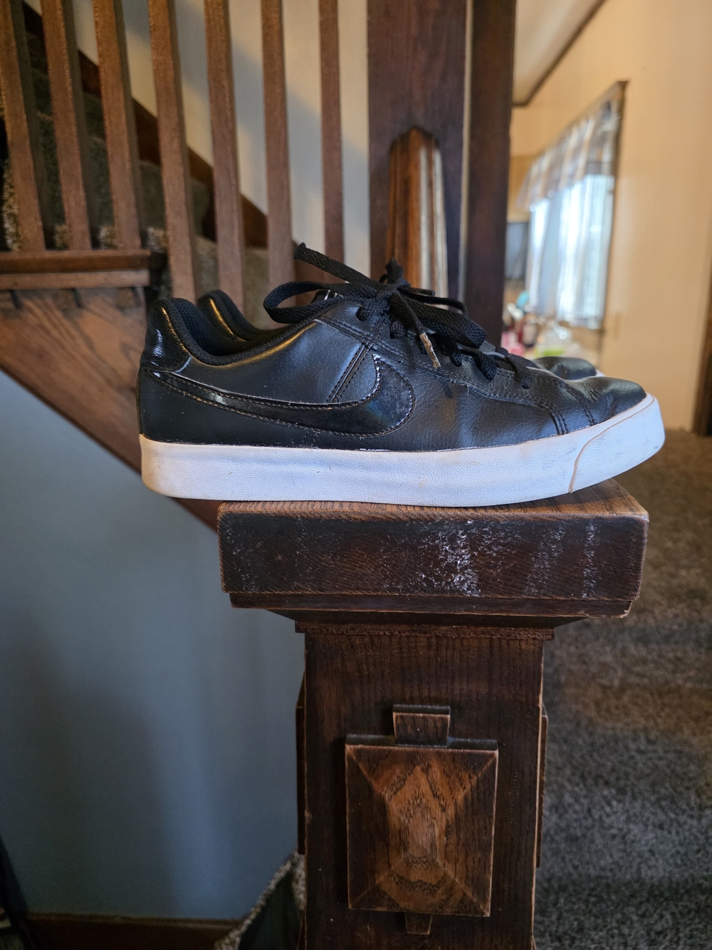Nike Women’s Black Leather Low-Top Sneakers with White Sole